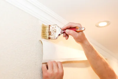 Pose de papier peint au Guislain — revêtements muraux et toiles de verre